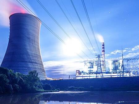 Landscape shot of an electric plan on a clear sunny day.